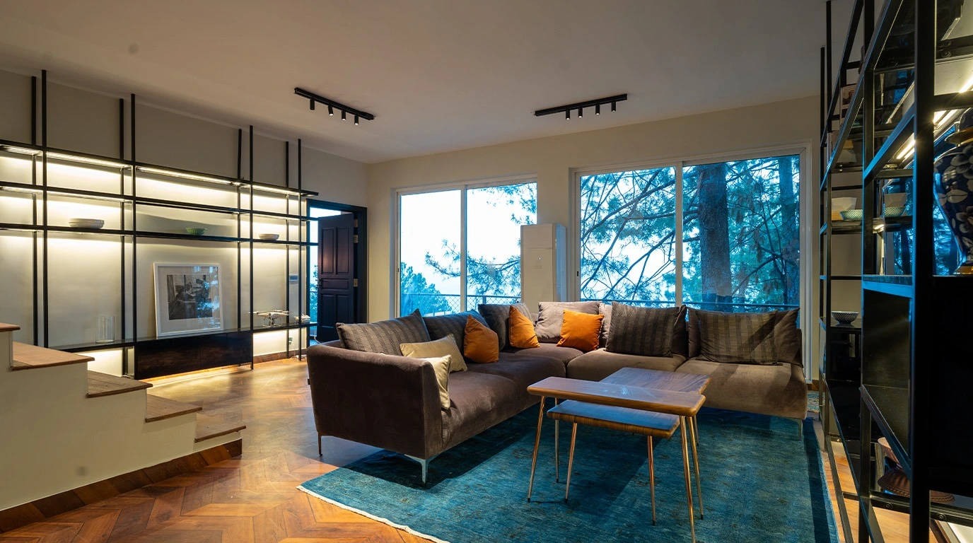 luxury villas in Murree vs Galiyat interior living room herringbone floor Blue Pin