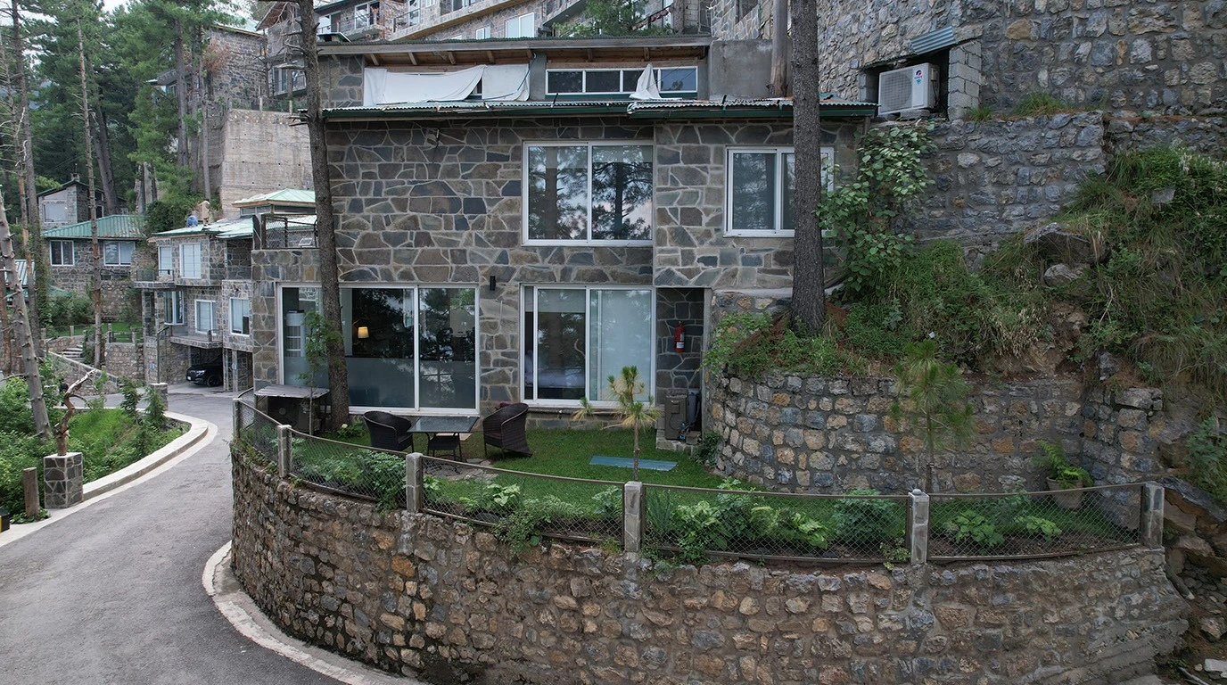 Stone luxury villa with private garden and paved road in Galiyat hill station — Blue Pine Mountain Homes Khaira Gali