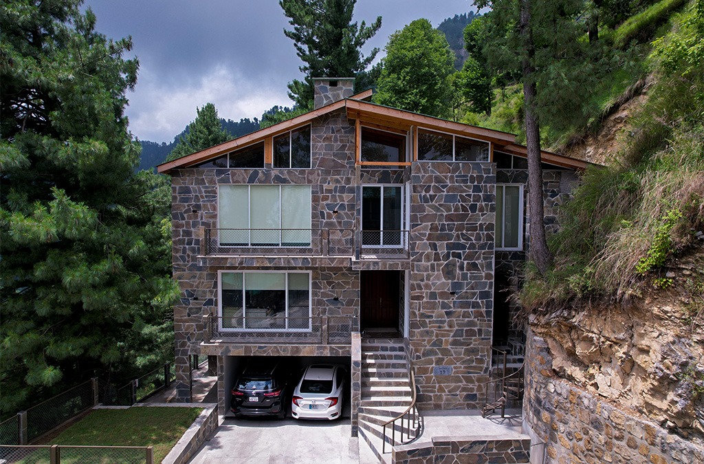 Stone villa front view – passive income real estate property in Pakistan