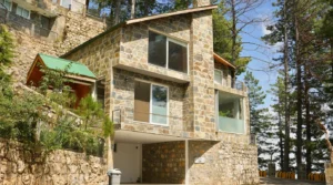House for sale on installments in Galiyat – pine forest villa with green roof