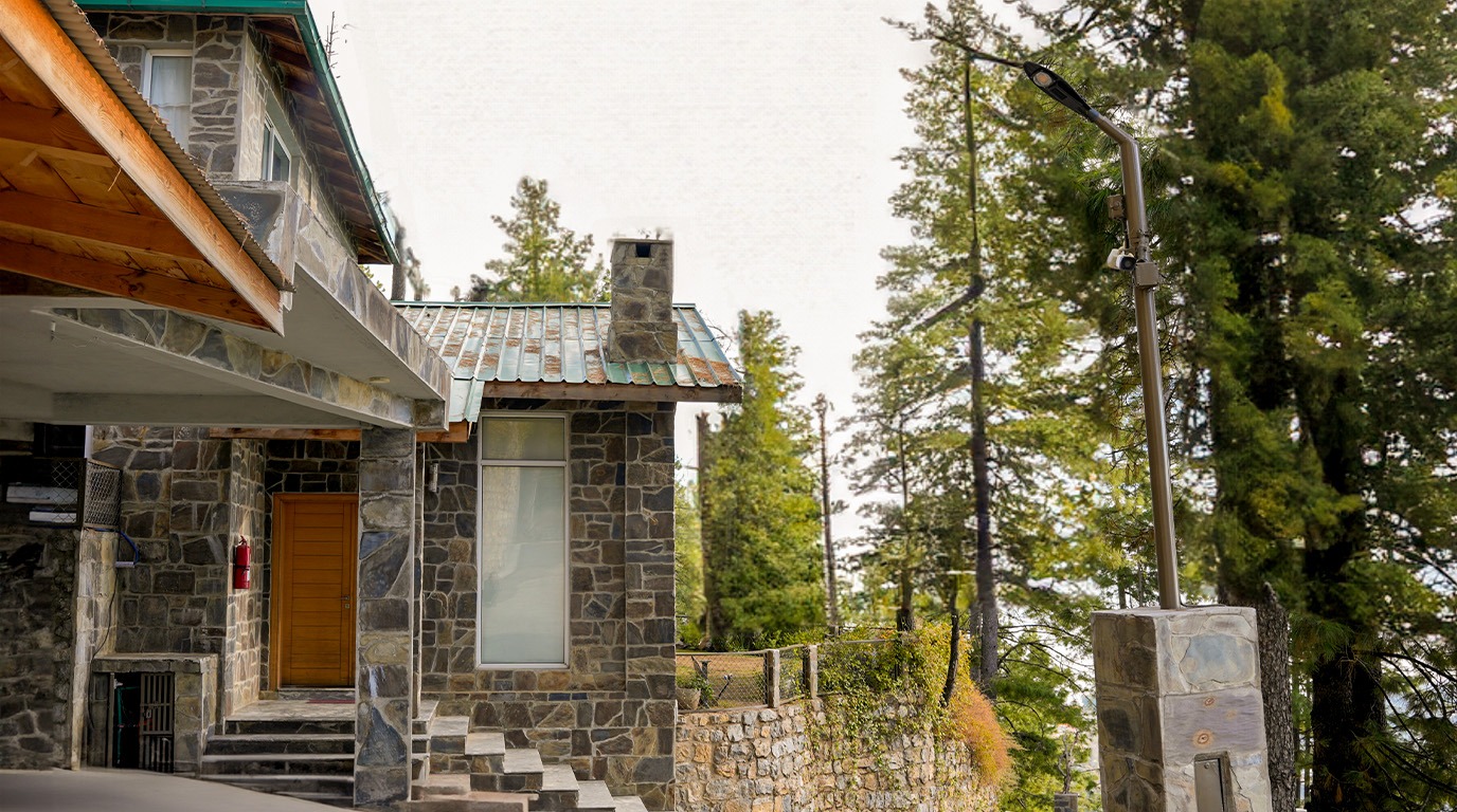 Investment property in Galiyat Pakistan – Blue Pine stone villa community exterior