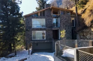 Completed stone villa at Blue Pine Mountain Homes, an example of luxury mountain homes Pakistan 2026 built for lasting quality