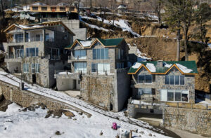 Row of completed villas at Blue Pine Mountain Homes community, a leading example of luxury mountain homes Pakistan 2026