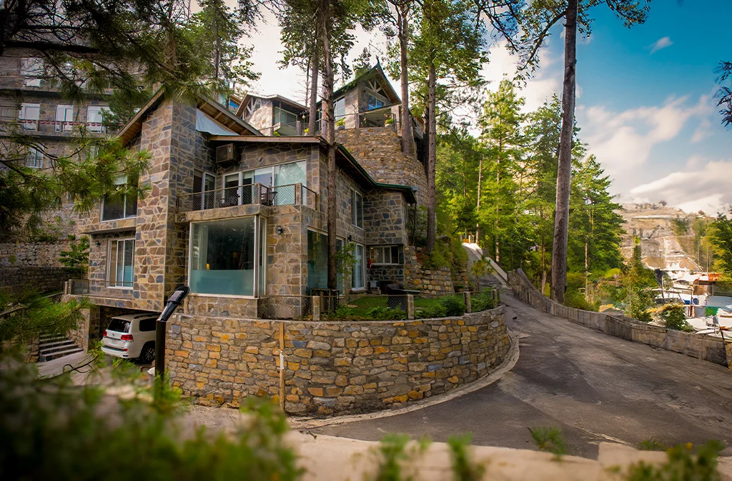 Premium real estate in Galiyat — completed stone villa with private driveway at Blue Pine Mountain Homes