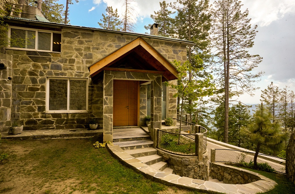 Investment property in Galiyat Pakistan – stone villa entrance Blue Pine Khaira Gali
